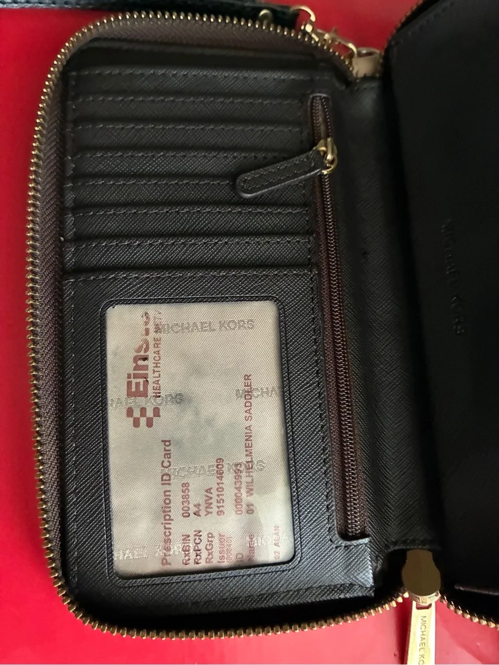 Michael Kors Black and Gold Logo Wristlet